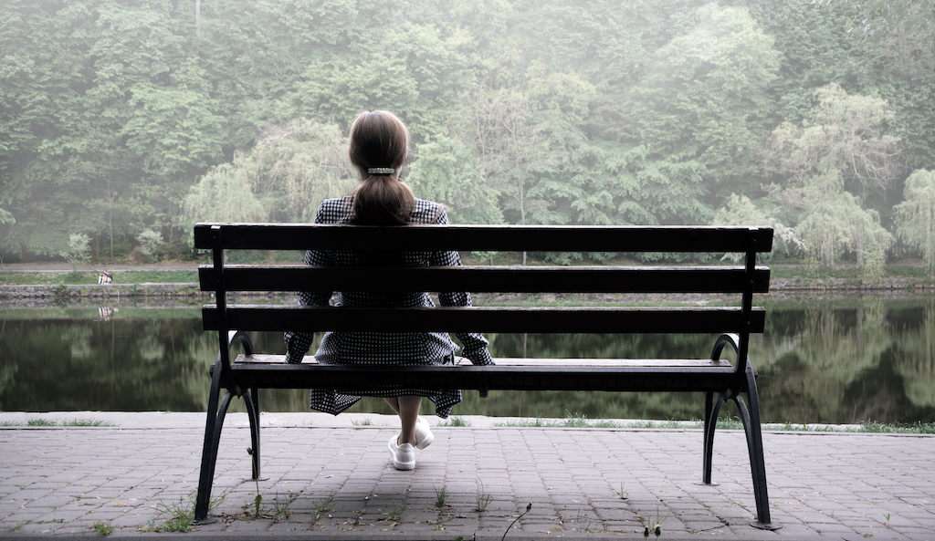 Girl on bench overlooking stream - What’s One Thing You’re Grateful for This Week? copy