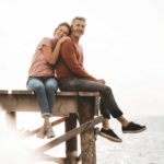 Pray for my Husband - Husband and wife sitting in a dock