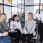 high-angle-business-meeting-with-females copy