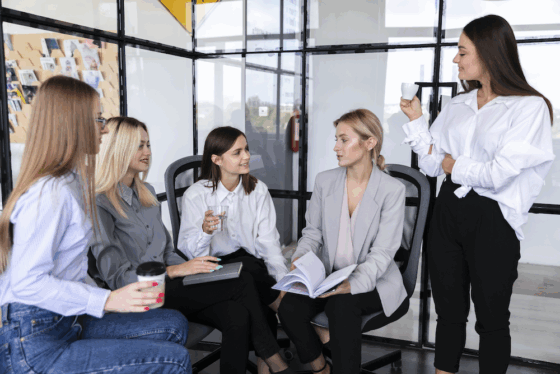 high-angle-business-meeting-with-females copy