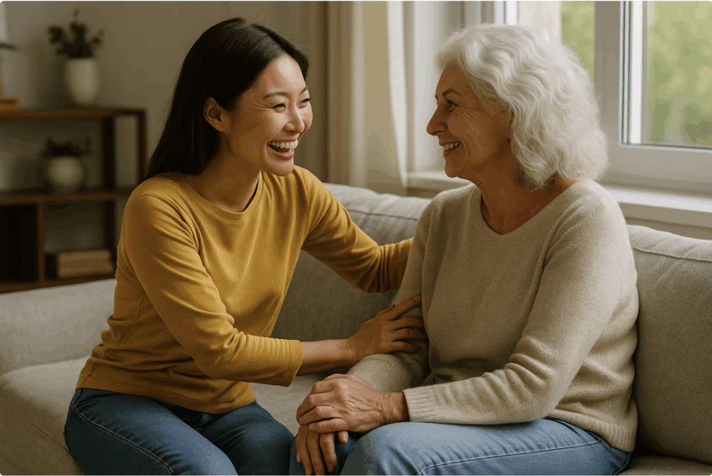Asian woman comforting an elderly woman